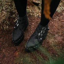 A9559 Women Black 3-Buckle Pointed Dino Lug Sole Boot